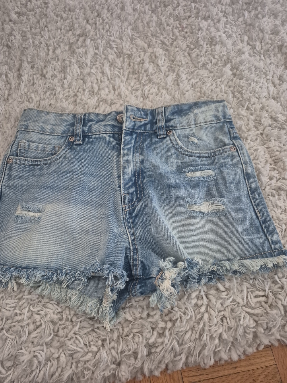 Women’s Light Blue Distressed Denim Shorts